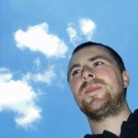 Professional headshot of Jay